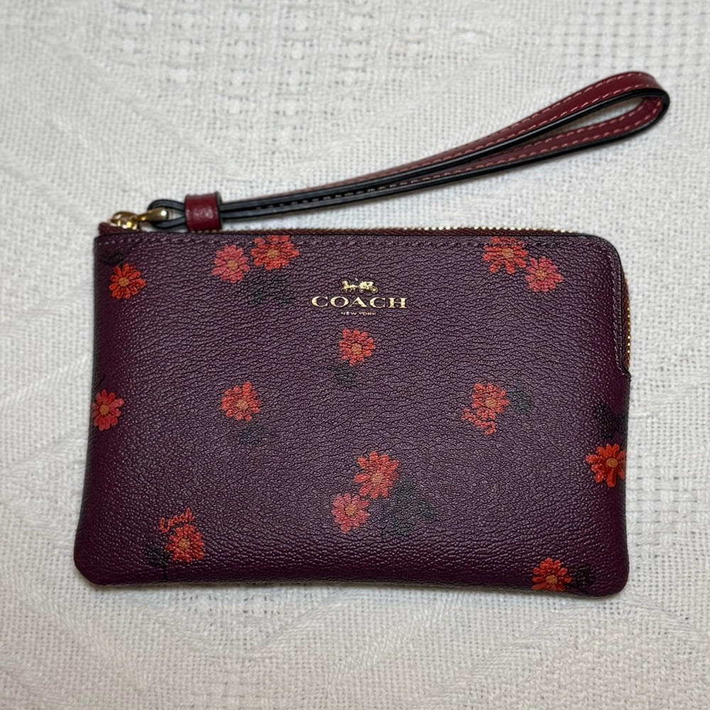 Coach Dark Red Wristlet with Floral Design